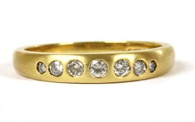 Lot 193 - An 18ct gold seven stone diamond ring