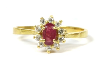 Lot 166 - A French gold ruby and paste cluster ring