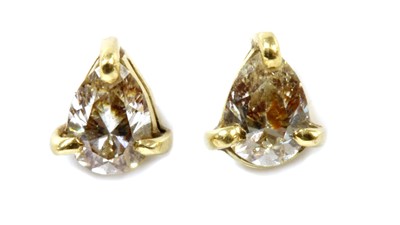 Lot 223 - A pair of gold single stone diamond stud earrings