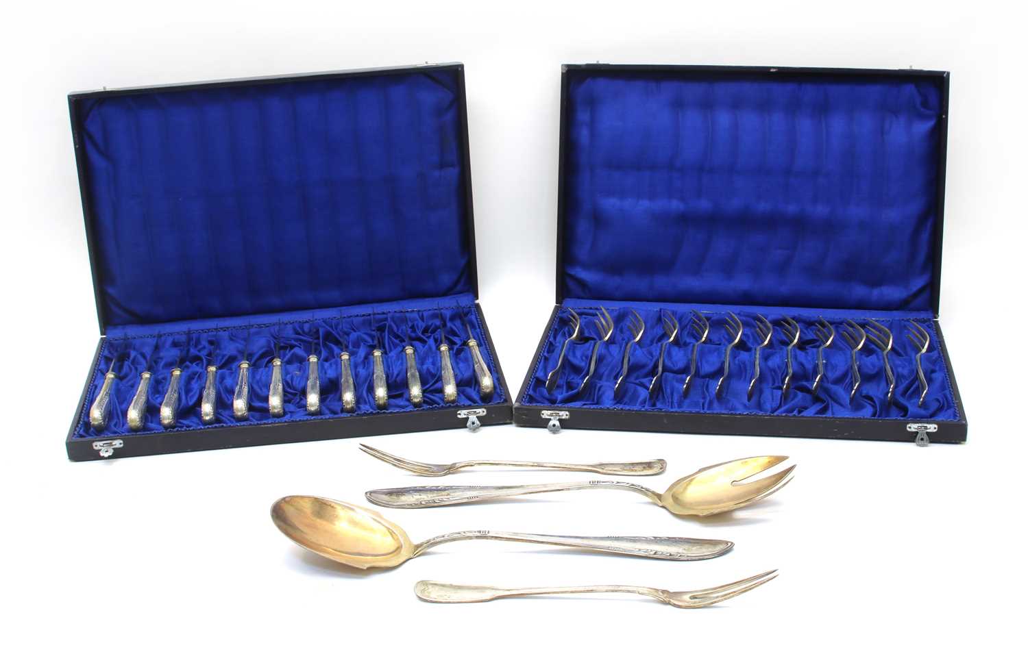 Lot 21 - A cased set of twelve 800 silver fruit knives and forks