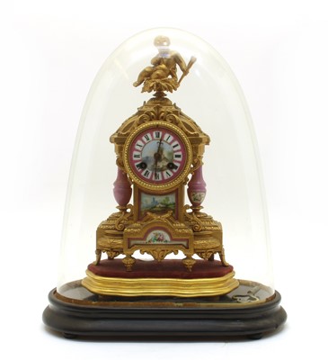 Lot 301 - A late 19th century French gilt cased mantle clock