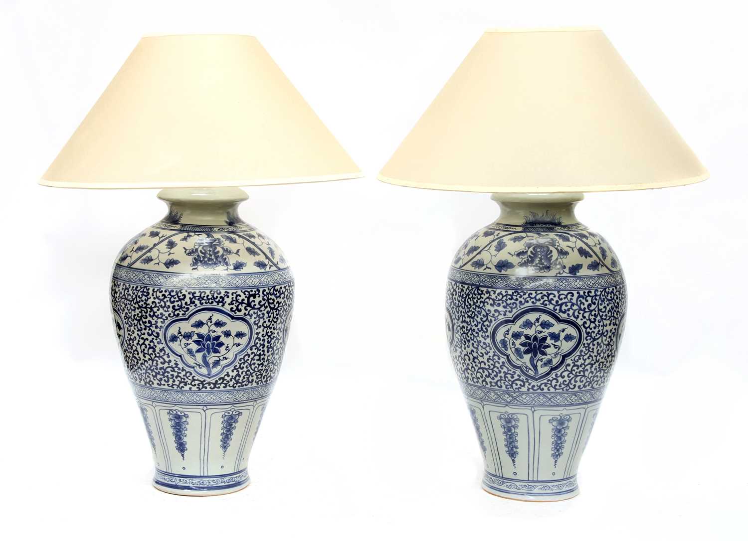 Lot 96 - A pair of large blue and white Chinese porcelain table lamps