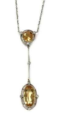 Lot 143 - An Art Deco topaz and diamond Edna May pendant, c.1925