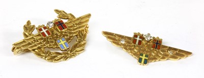 Lot 360 - A Scandinavian Airlines gold diamond and enamel brooch