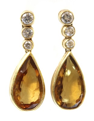 Lot 307 - A pair of gold citrine and diamond drop earrings