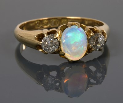 Lot 107 - An 18ct gold late Victorian three stone opal and diamond ring