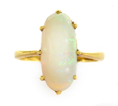 Lot 19 - An Edwardian gold single stone opal ring