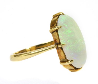 Lot 19 - An Edwardian gold single stone opal ring