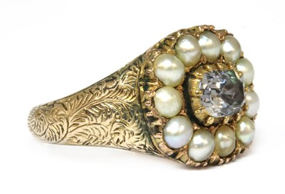 Lot 28 - A white sapphire and split pearl cluster ring