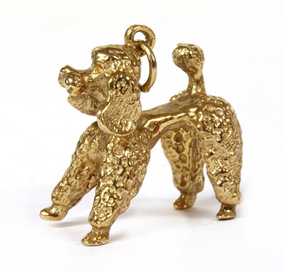 Lot 328 - A gold poodle charm