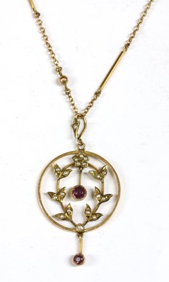 Lot 39 - A gold garnet and split pearl pendant