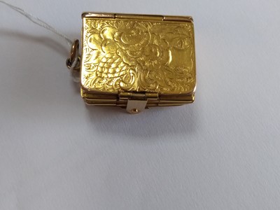Lot 62 - A Victorian rectangular hinged locket of book form