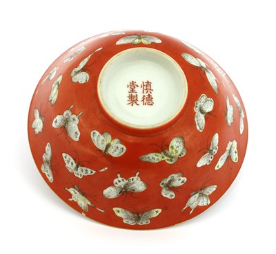 Lot 122 - A Chinese coral-ground famille rose bowl