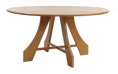 Lot 237 - A teak dining table
