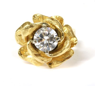 Lot 228 - A gold flower head ring