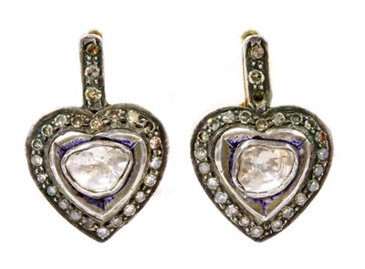 Lot 161 - A pair of gold and silver heart shaped foil-backed diamond earrings