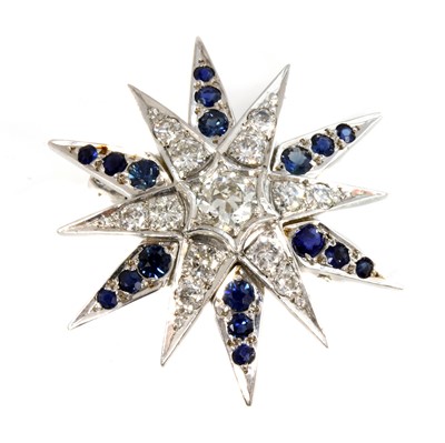Lot 286 - A white gold diamond and sapphire India Star brooch