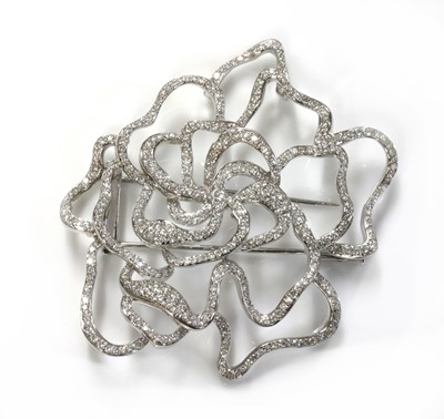 Lot 90 - A Continental white gold diamond set ghost rose brooch