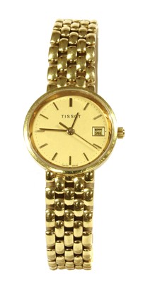Lot 477 - A ladies' gold Tissot quartz bracelet watch