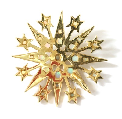 Lot 261 - A 9ct gold opal star pendant