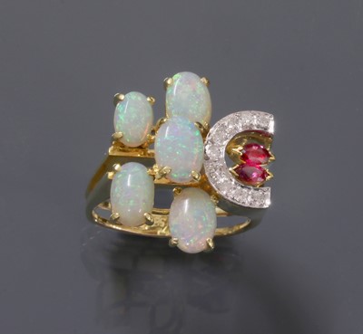 Lot 197 - A Continental opal, ruby and diamond asymmetrical cluster ring, c.1970
