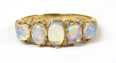 Lot 259 - A 9ct gold five stone opal ring
