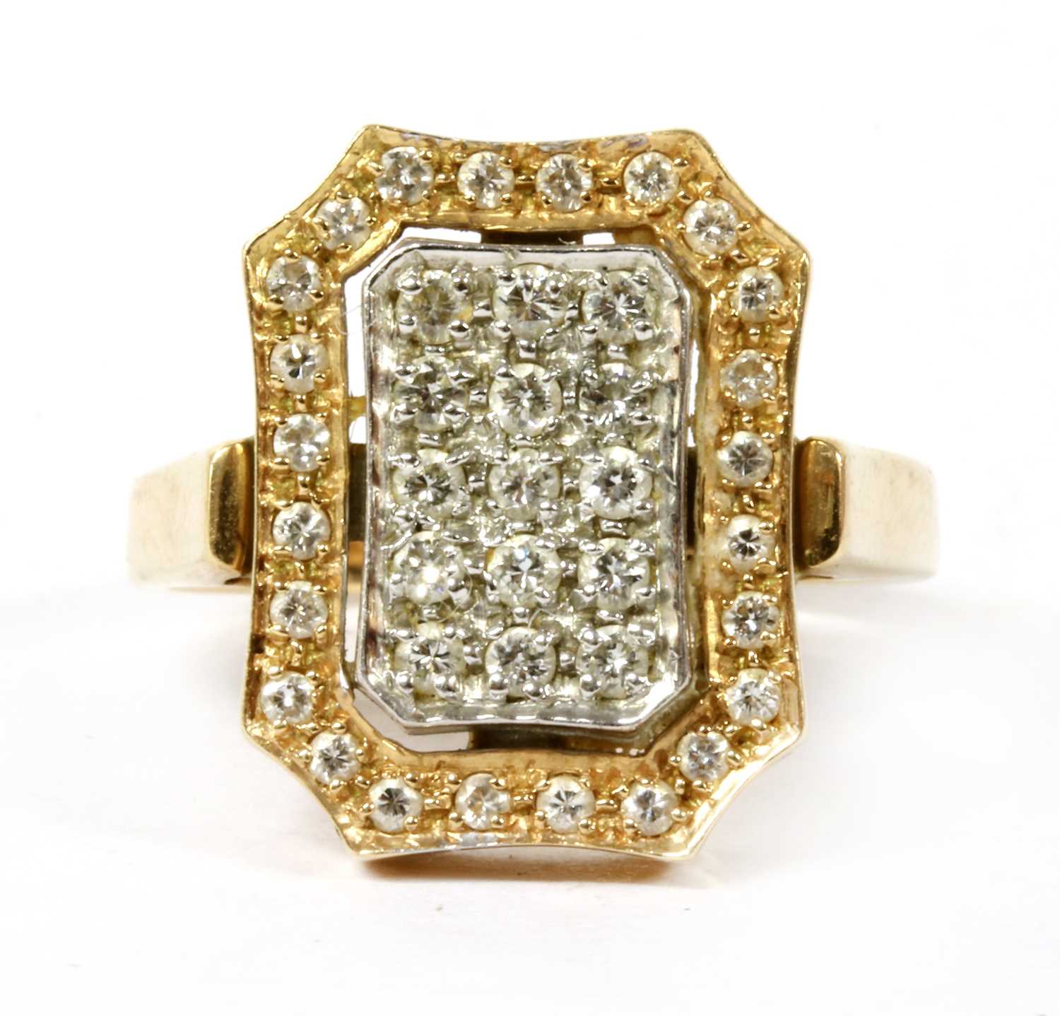 Lot 1182 - A two colour gold pavé diamond ring