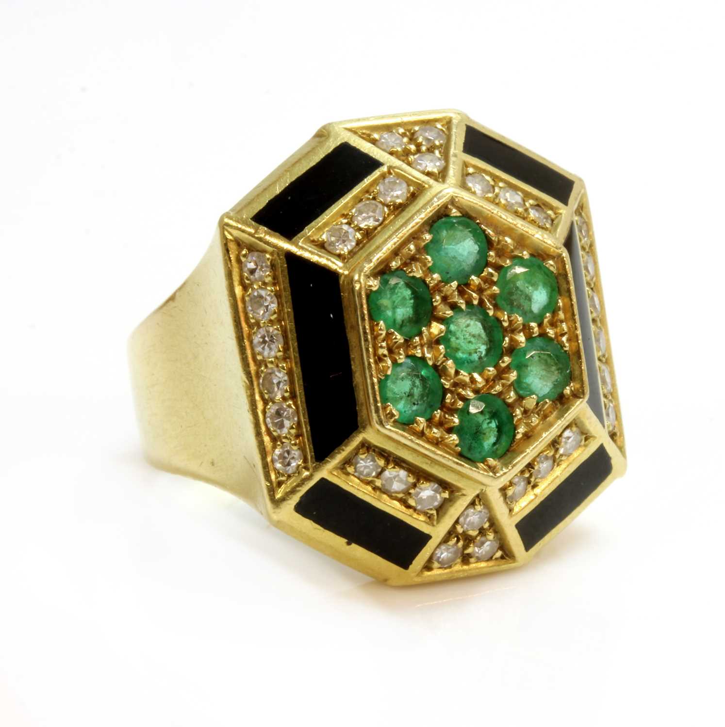 Lot 198 - An Italian emerald, diamond and black enamel ring, with an octagonal domed head, c.1960