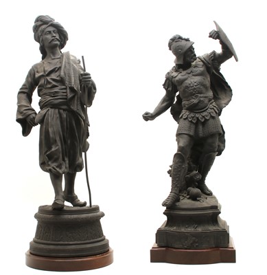 Lot 214 - After Ch. Perron, a cast metal figure of an Indian figure carrying a staff