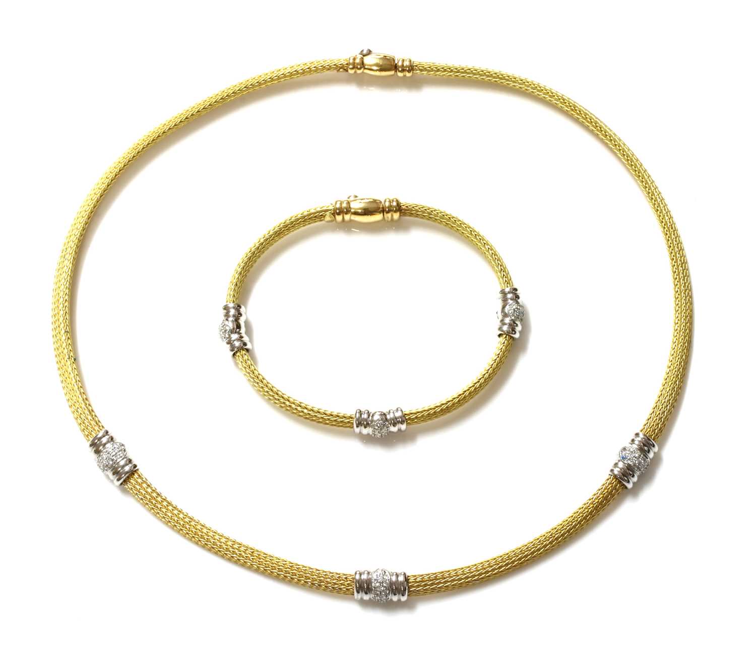 Lot 319 - An 18ct yellow and white gold diamond set necklace and bracelet suite, by Italian Lynx