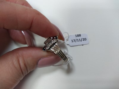 Lot 188 - A Continental sapphire and diamond bow ring, c.1940