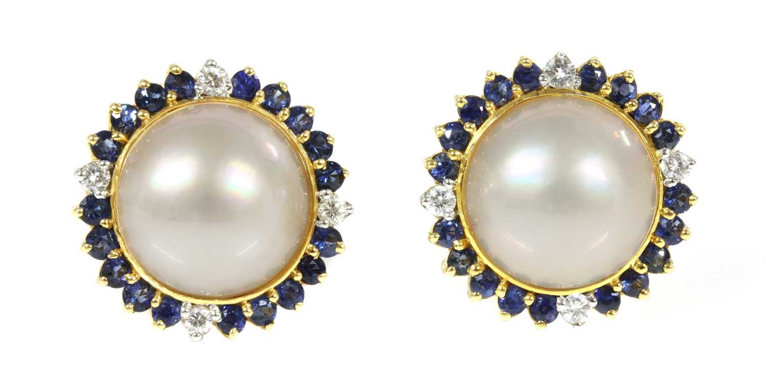 Lot 235 - A pair of 18ct gold cultured mabé pearl, sapphire and diamond earrings