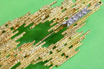 Lot 195 - An 18ct gold diamond set brooch and earring suite by Andrew Grima, c.1970