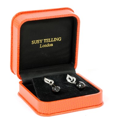 Lot 377 - A pair of 18ct white gold diamond and onyx set drop earrings, by Susy Telling