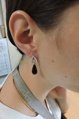 Lot 377 - A pair of 18ct white gold diamond and onyx set drop earrings, by Susy Telling