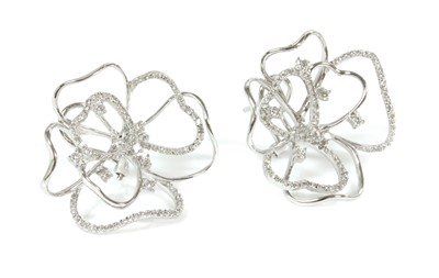 Lot 369 - A pair of 18ct white gold diamond set ghost rose earrings