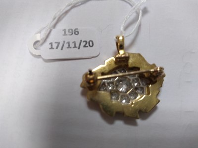 Lot 196 - A yellow and white gold diamond set brooch pendant
