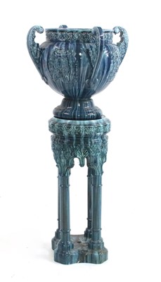 Lot 548 - A Victorian mottled blue glazed pottery jardiniere and stand
