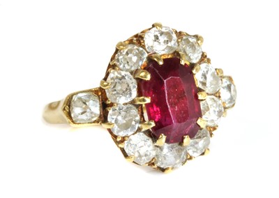 Lot 41 - A late Victorian ruby and diamond oval cluster ring