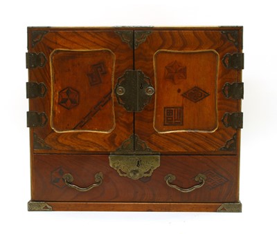 Lot 334 - An early 20th century Japanese Tansu type table cabinet