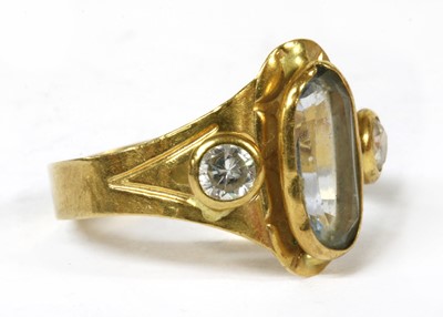Lot 232 - A gold three stone synthetic spinel ring