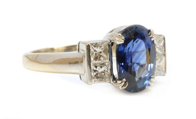 Lot 452 - A white gold sapphire and diamond ring
