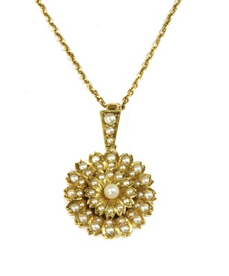 Lot 38 - An Edwardian gold split pearl brooch/pendant