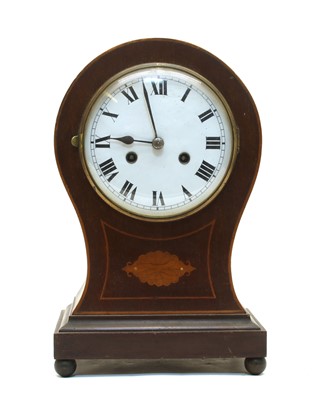 Lot 81 - Edwardian inlaid mahogany balloon mantel clock