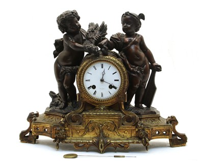 Lot 82 - A 19th century bronzed and gilt spelter mantel clock