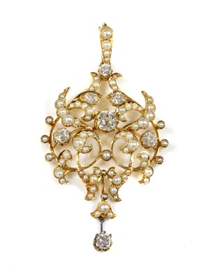 Lot 96 - A late Victorian diamond and split pearl cartouche shaped brooch/pendant, c.1890