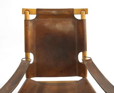 Lot 391 - An Italian leather and pine chair