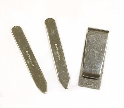 Lot 422 - A sterling silver money clip, by Cartier