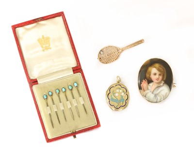 Lot 361 - A rose gold tennis racquet brooch