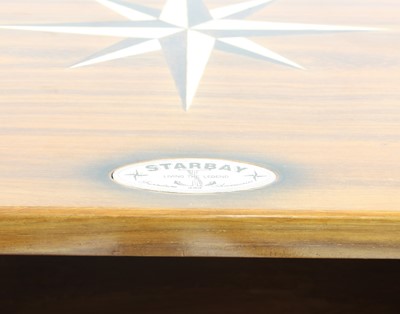 Lot 556 - A 'Starbay Indochine' rosewood finish and compass rose inlaid writing desk